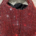 Mini red rhinestone bucket handbag with shimmering crystals and black fabric lining - Red
