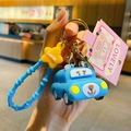 Blue silicone car keychain featuring a yellow star charm and a pink cartoon display card - Animal Car Keychain-Blue Bear