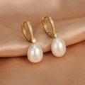 Close-up of 18K gold-plated earrings with freshwater pearls and sparkling zircon pavé - ER1493-A Zirconia Hoop Drop Pearl