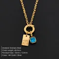 Collar de acero inoxidable dorado con colgante letra X y piedra azul - Letra X