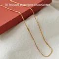 Golden embossed snake bone chain necklace in minimalist stainless steel for women - 50 cm / Embossed Snake Chain (Gold)