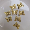 Detailed macro view of 14K gold butterfly hollow charms for jewelry making DIY - Hollow Double Loop Butterfly / 18k Gold Color Preserved