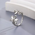 Polished silver adjustable open ring featuring unique double daisy flower motifs - Silver Hollow Double Flower Ring (A-1052)