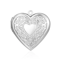 Detailed view of silver heart-shaped locket pendant with intricate floral engravings - Smooth Center Flower Border Heart Style