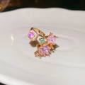 Elegante anello aperto in oro con zirconi rosa a stella e gemme multicolori brillanti - Oro-Rosa