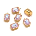 Detailed macro view of rectangular light purple topaz pendants with gold borders - Single-Loop Style / Pink