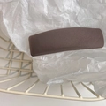 Close-up of a matte dark brown fabric sponge hair clip on a minimalist textured background - Light Coffee