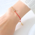 Chic red string bracelet with gold-plated titanium chain and pink gemstone inlay - October Rose