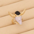 Detail of bohemian gold ox-head ring with black faceted gemstone in jewelry display - Gold Black White Contrast Bull Head (9#)