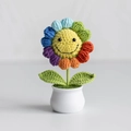 Handmade crochet rainbow sunflower plant in a white ceramic pot with cute smiling face - Colorful Rainbow Sunflower