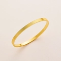 Bracciale rigido minimalista in acciaio al titanio dorato con scanalature e numeri - Oro