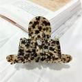 French retro acetate hair claw with tortoiseshell pattern bow design on white fabric - Dark Tortoise Star