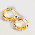 Minimalist golden huggie earrings with yellow, white and blue enamel evil eye pattern - Yellow
