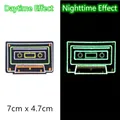 Luminous cassette tape embroidery patch showing day and night glow effects - Cassette Style (GZ-05548-12) / 7cm x 4.7cm