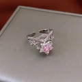 Detail of silver adjustable ring with pink star-shaped zircon and wavy pave crystal band - Star Style / Silver-Pink