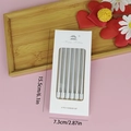 Pack of 6 silver long birthday candles in a white box with transparent window display - Silver Pencil Candles