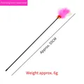 Cat wand toy featuring flexible black rod and pink feather insect topper, 55cm length - Pink Little Fly Cat Teaser