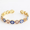 Adjustable gold plated bracelet with blue evil eye enamel and purple zircon charms - Oval Blue