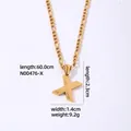 Collana a catena Figaro in acciaio al titanio dorato con ciondolo lettera X testurizzato - Lettera X / Oro