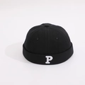 Close-up of black cotton docker hat featuring white letter P embroidery on the side - Black / 1-4 Years