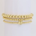 Three-layer gold beaded bracelet set with round initial tag featuring letter E - Letter E