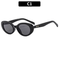 Lunettes de soleil ovales noires avec monture épaisse et détails d'étoiles dorées - Noir