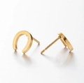 Macro detail of gold-plated horseshoe stud earrings with a polished metallic finish - Golden Horseshoe Shape (300 Gold)