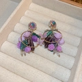 Macro detail of purple crystal floral drop earrings in a premium velvet gift box - Silver Pin - Purple Flower Drop Earrings