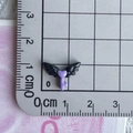 Macro shot of 1.5cm dark purple resin heart wing charm with ruler for size reference - 08*Black Purple Wing Key Mini
