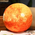 Spherical sun planet plush toy with orange fire patterns on a natural wooden table - Small 17cm / Sun