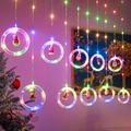 Christmas LED ring lights with festive Santa Claus and reindeer figurines in colorful glow - Multicolor USB Remote Ring