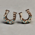 Macro detail of wooden horseshoe stud earrings with faux cowhide print and turquoise dots - 4-Cow Print Horseshoe
