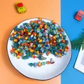 Space-themed mini eraser set featuring cute astronaut and rocket shapes in a tray - Mini Space Theme