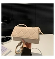 Close-up of beige quilted PU leather crossbody bag with knot shoulder strap detail - Khaki