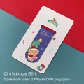 Magnetisches Lesezeichen mit Weihnachtsbär-Motiv auf blauem Grund und Festtagsdruck - Weihnachtsgeschenk