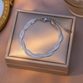 Silver triple-strand twisted snake chain bracelet in polished stainless steel - Silver Bracelet