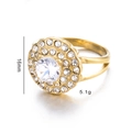 Detail shot of a gold ring with circular clear gemstone cluster and split shank design - US 6 / Gold Round Style (Gold 3)