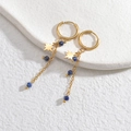 Detail of 14K gold plated stainless steel star earrings with blue beads and dainty chains - Blue