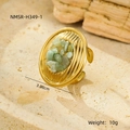 Macro shot of gold-plated ring showing 3.08cm oval textured stone inlay details - One Size / Green Stones / Green