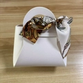 Elegant white leather-texture wedding favor box with a vintage printed satin handle - Pure White