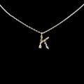 Letter K pendant necklace in silver with colorful zircon stones on black background - Letter K / Silver