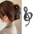 Elegante pinza para el cabello con forma de nota musical en color metalizado y perla - Color gunmetal
