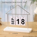 Silver metal house shape perpetual flip calendar with white wooden base and months - House Shape Silver