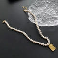 Elegant baroque pearl necklace with a golden pendant engraved with Do what you love - 05-D12 Natural Pearl Necklace Square Plate Engraved Pendant