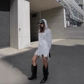 White distressed knit two-piece set featuring hooded crop top and fringed mini skirt - S / White