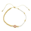 Adjustable woven bracelet with gold beads and a centered pink faceted gemstone charm - Pink