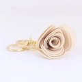 Porte-clés rose en cuir beige avec anneau en métal doré pour sacs à main - Blanc