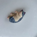 Cute grey and beige cartoon cat hair clip in a 3D laying pose made of resin - Grey Stripe