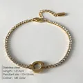 14K gold plated tennis bracelet with clear zircon stones and a screw-motif round pendant - Screw Motif Circle Pendant Tennis Chain (XBL0036-2)