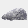 Macro detail of grey newsboy cap showing white daisy floral pattern and fabric texture - Adjustable / Gray